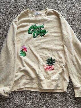 Cream Crewneck Sweatshirt with Green Graphic Logos